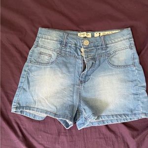 stretchy light wash high waisted three button shorts